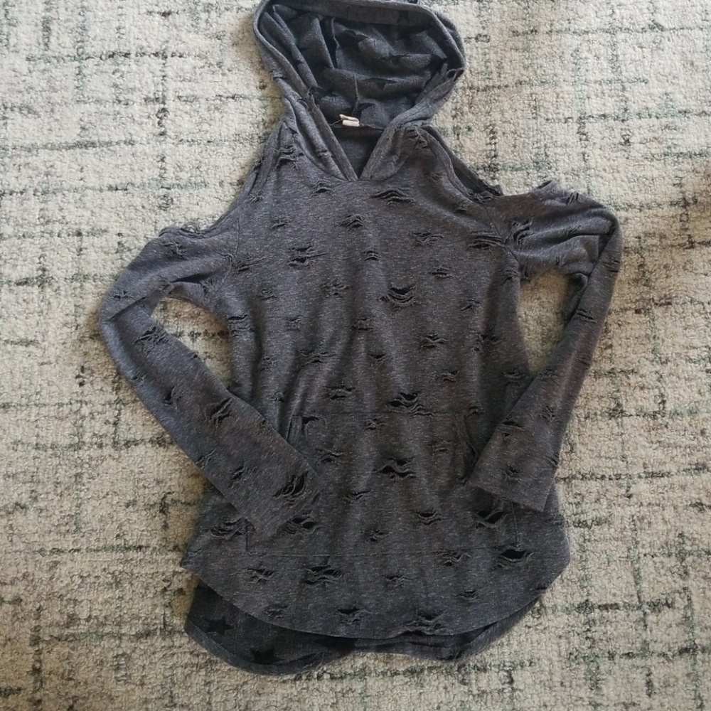 Distressed cold shoulder top